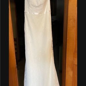 New wedding dress, never worn or altered.